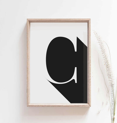 White Letter c print in a box frame