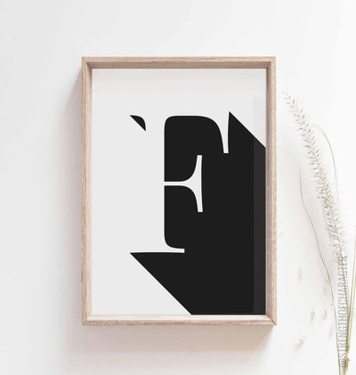 White Letter f print in a box frame