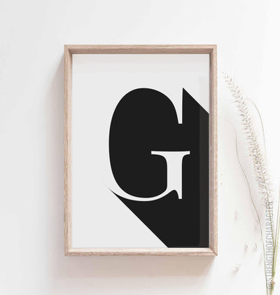 White Letter g print in a box frame